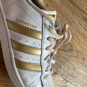 Golden adidas sneakers